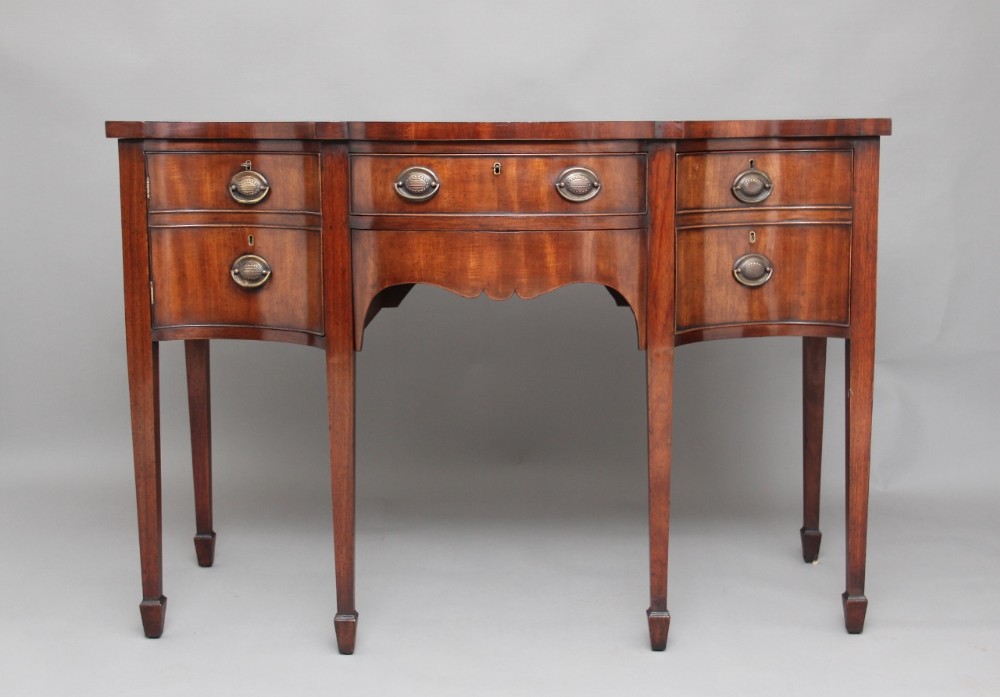Early 19th Century mahogany serpentine sideboard