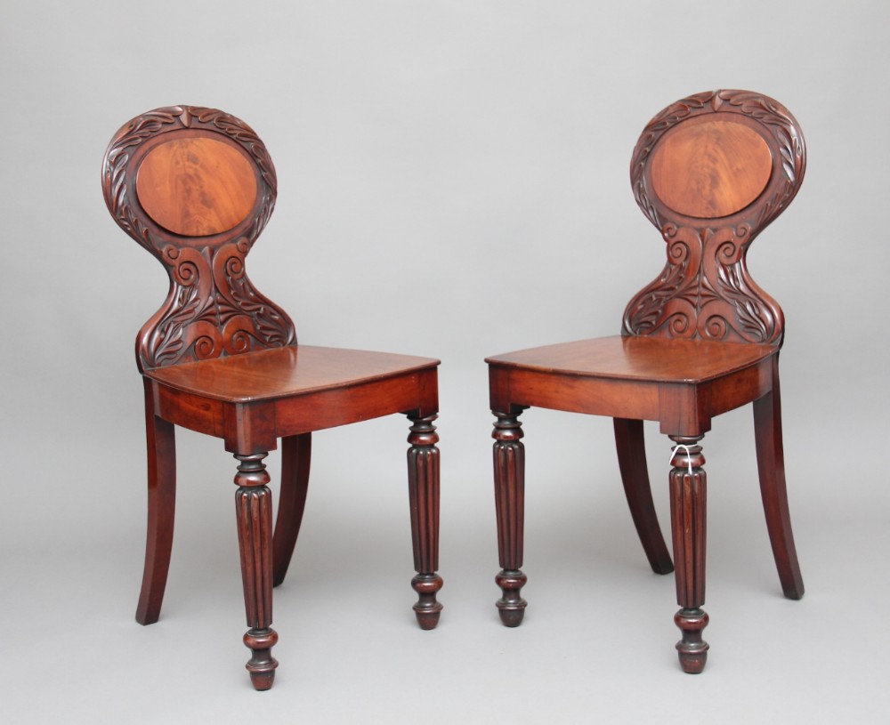 Pair of 19th Century mahogany hall chairs