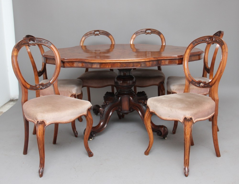19th Century Victorian walnut table and six dining chairs