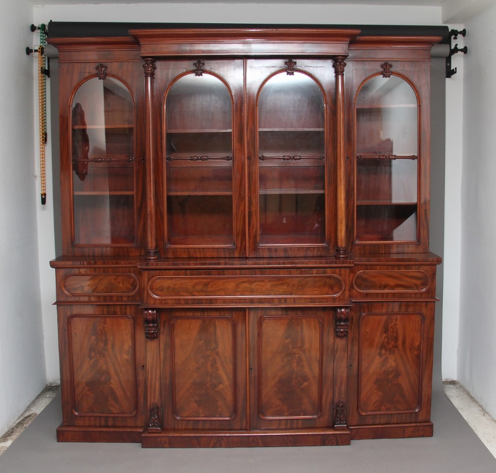 Early 19th Century flame mahogany breakfront bookcase