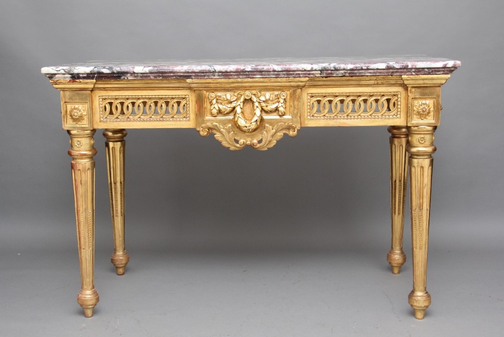 19th Century carved and gilt marble top console table