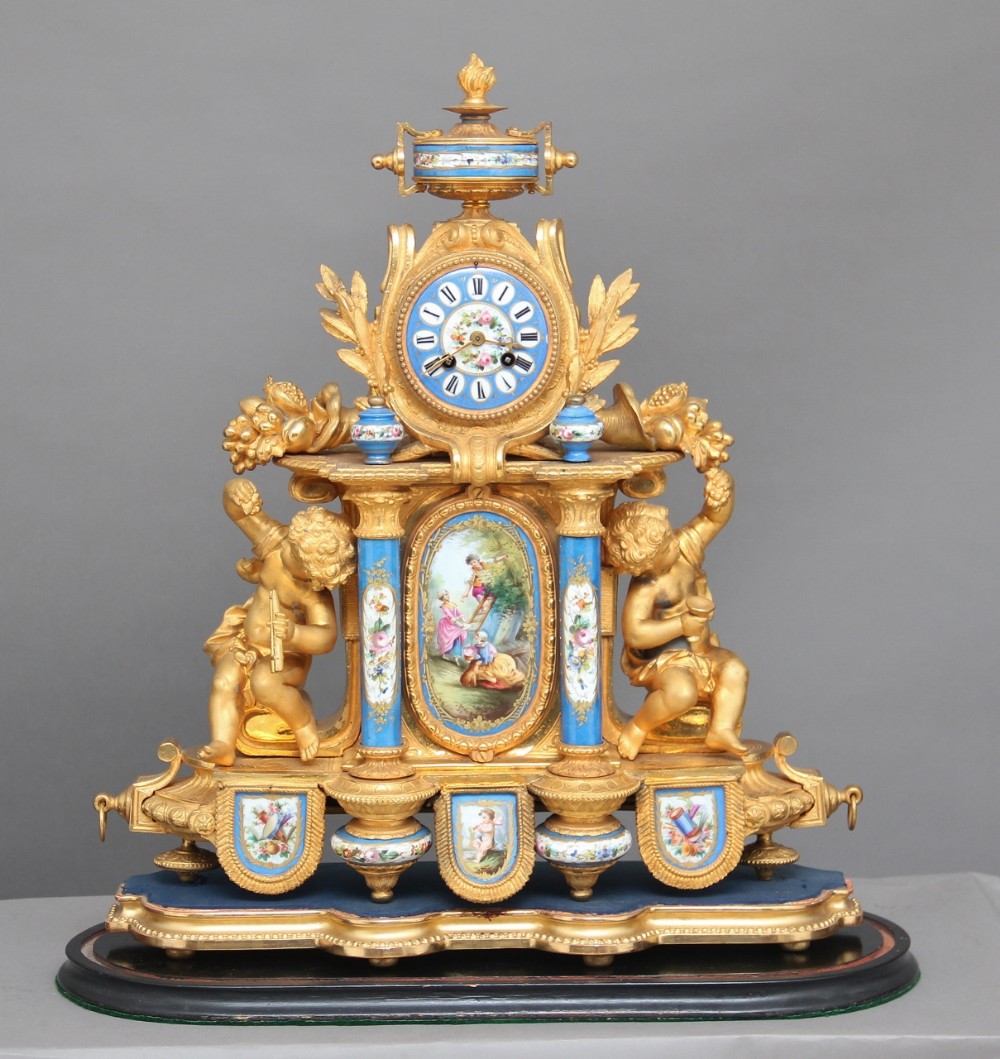 19th Century gilt metal and porcelain mantle clock