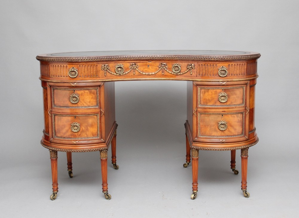 Early 20th Century satinwood kidney desk