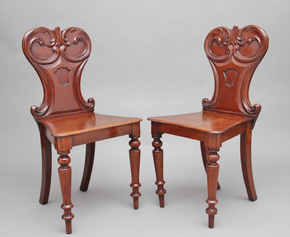 Pair of 19th Century mahogany hall chairs