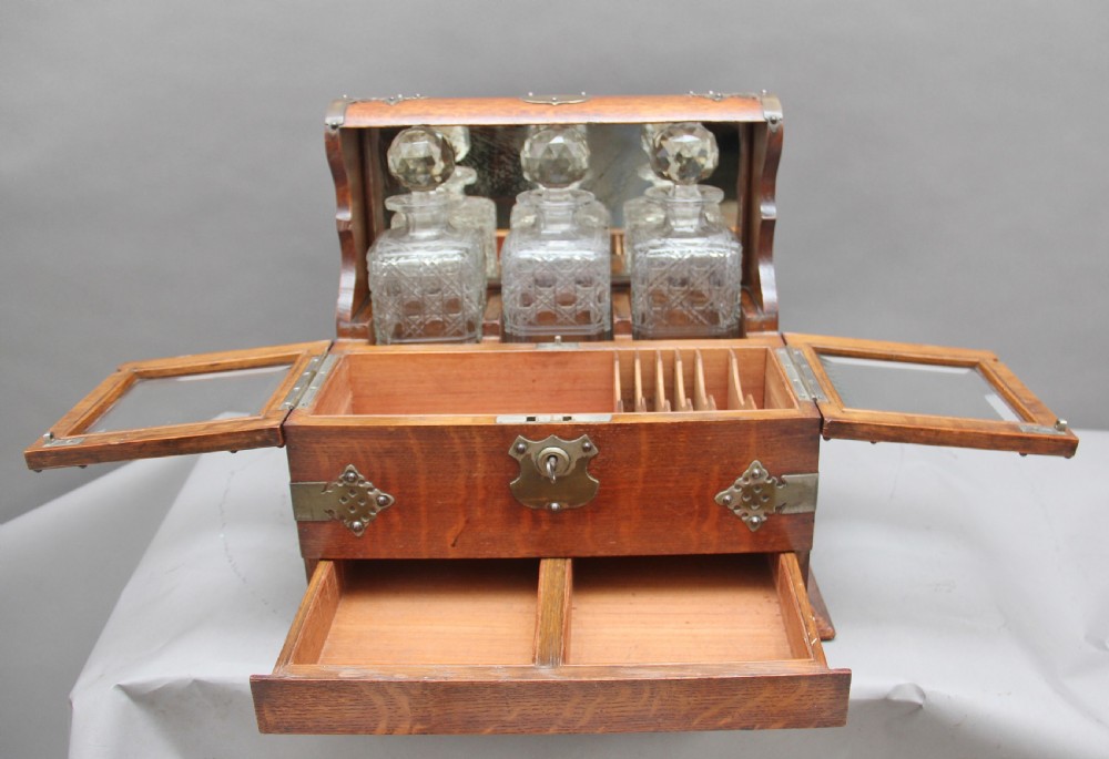 19th Century oak and silver plated tantalus View V