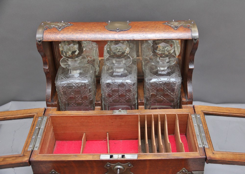 19th Century oak and silver plated tantalus View VI