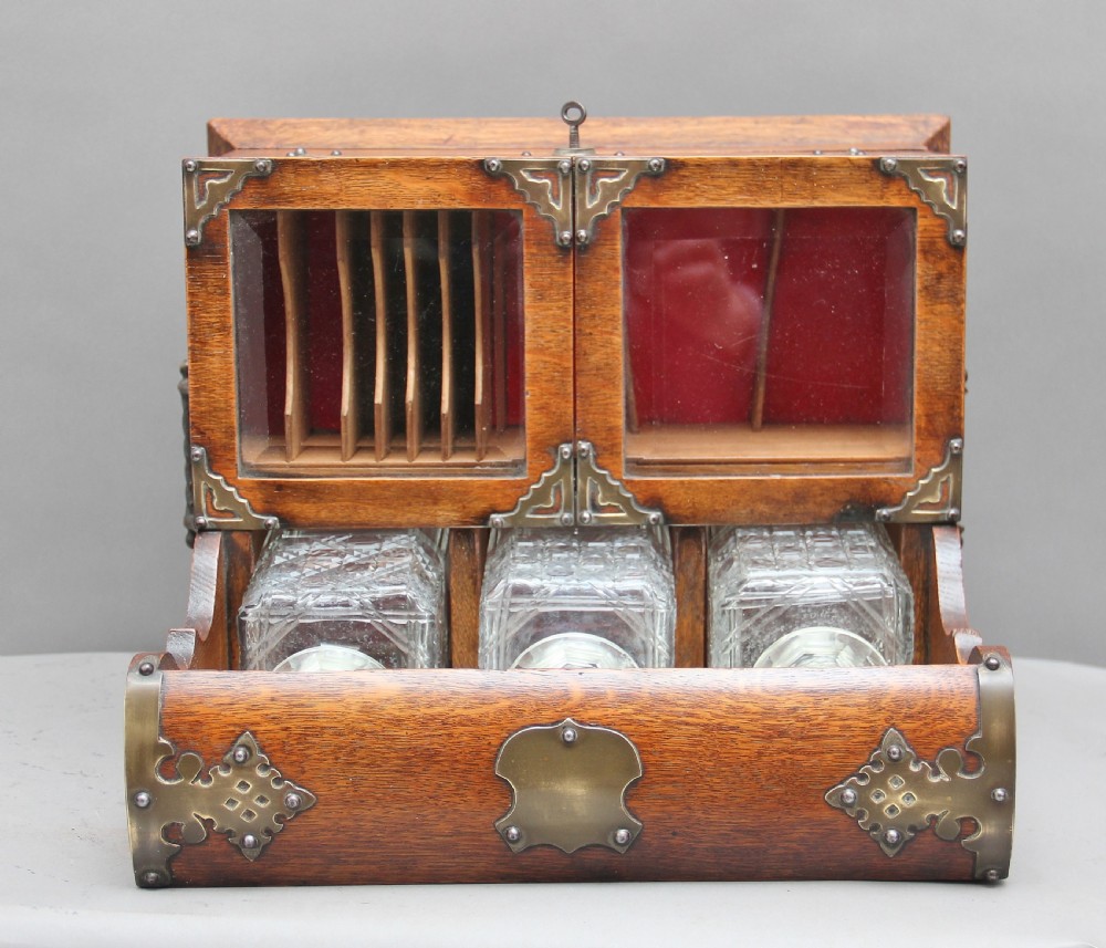 19th Century oak and silver plated tantalus View X