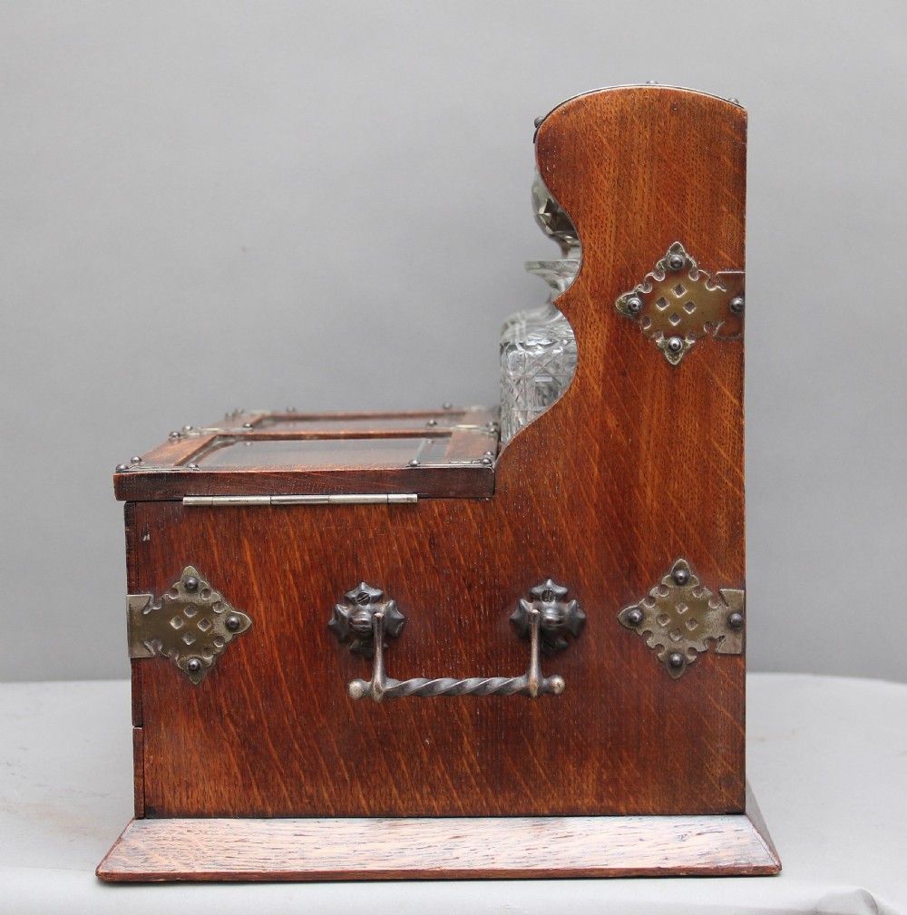 19th Century oak and silver plated tantalus View XI
