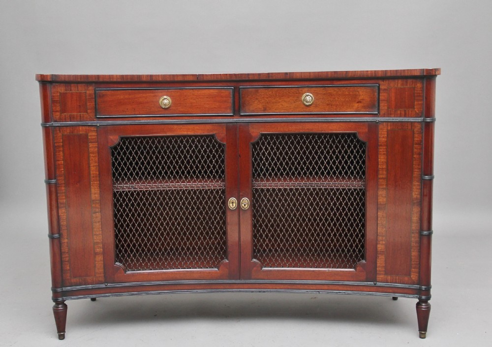 Early 20th Century concave mahogany cabinet