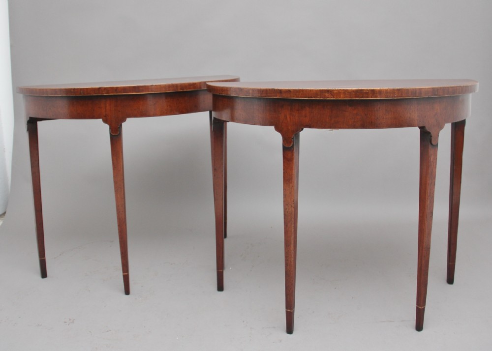 Pair of early 20th Century mahogany console tables