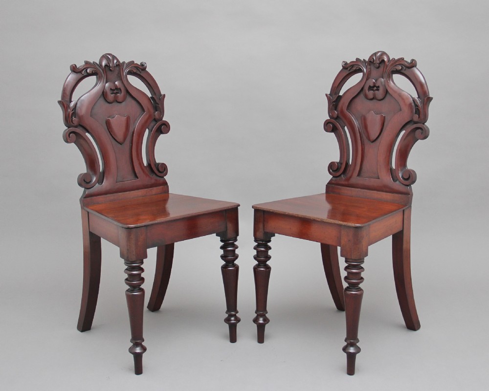 Pair of 19th Century mahogany hall chairs