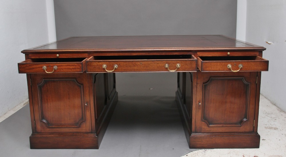 Large early 20th Century mahogany partners desk View XIII