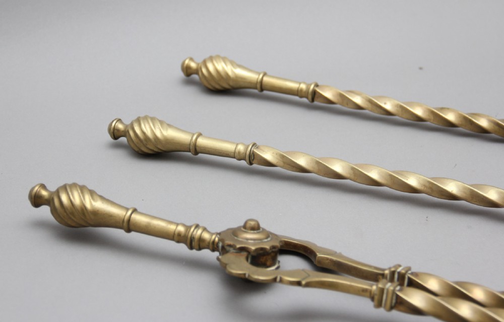 Set of 19th Century brass fire irons View V