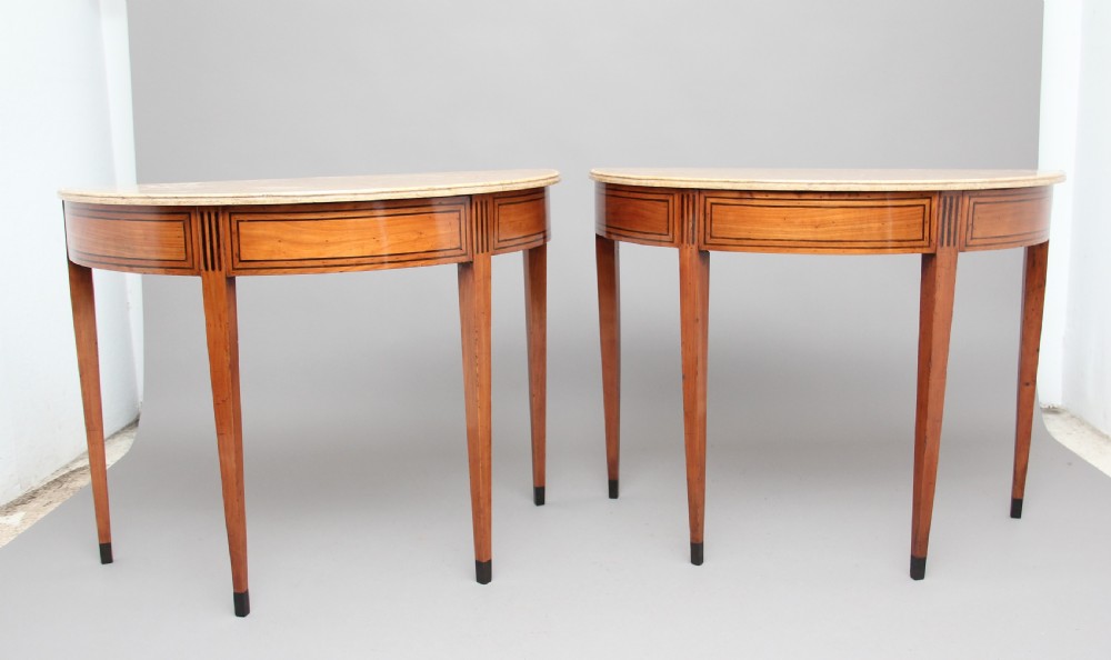 A pair of early 19th Century Italian console tables
