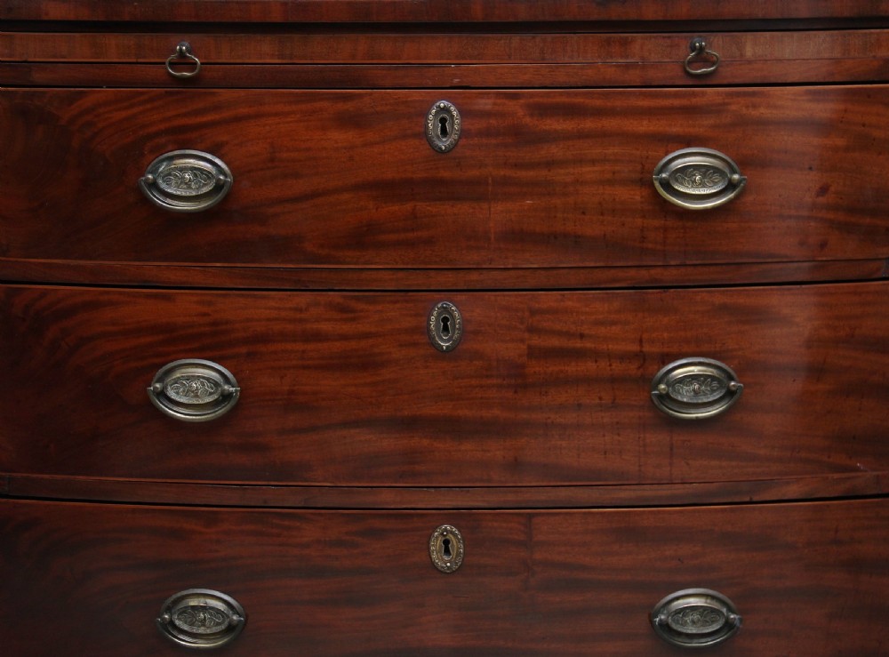 Early 19th Century mahogany bowfront chest with slide View XI