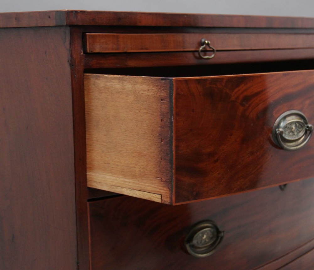 Early 19th Century mahogany bowfront chest with slide View XII
