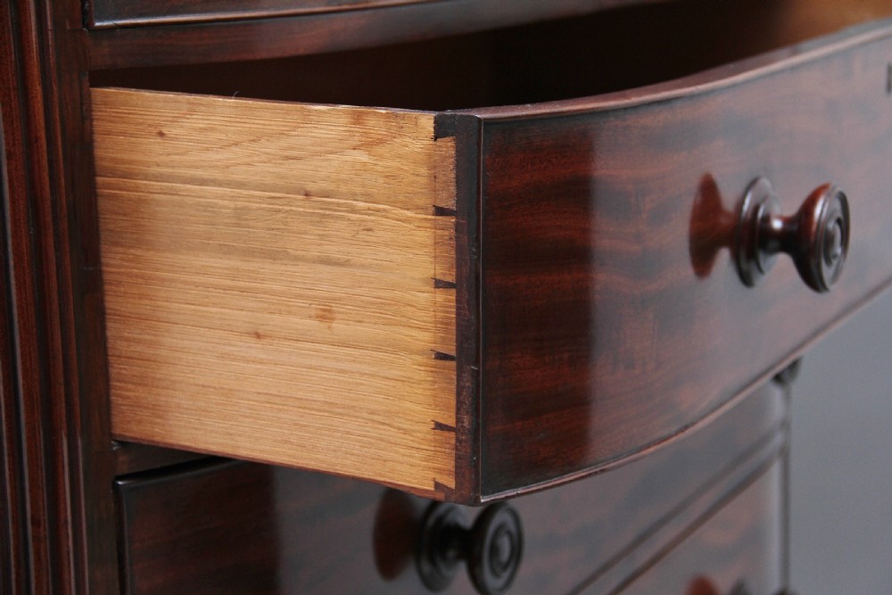 Early 19th Century flame mahogany chest of drawers View XII