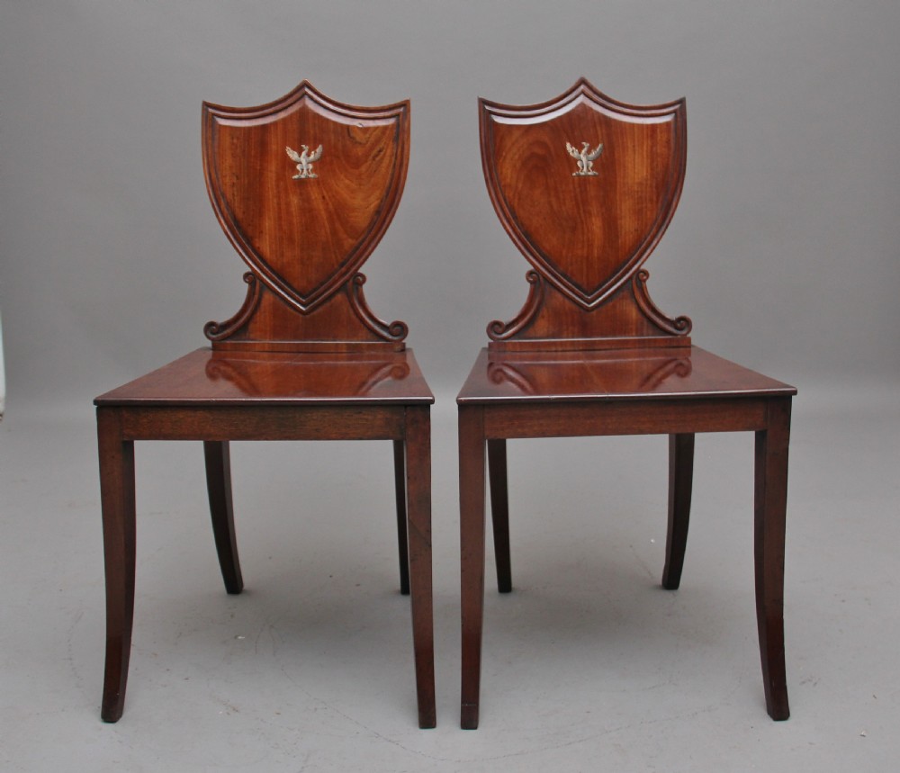 Pair of early 19th Century mahogany hall chairs View II
