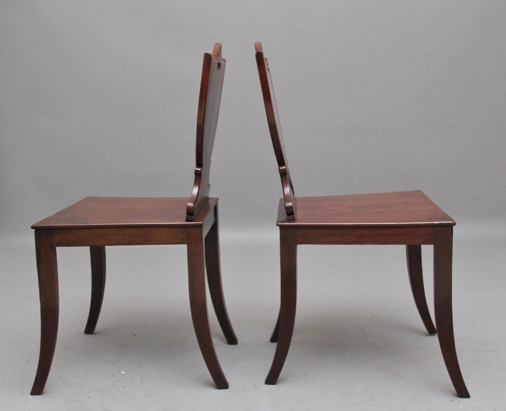 Pair of early 19th Century mahogany hall chairs View V