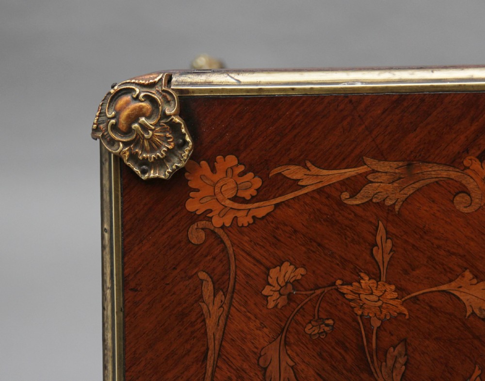 A 19th-century French Rococo revival kingwood fold-over card table with floral marquetry inlay, cabriole legs, and ornate gilt ormolu mounts. View IX