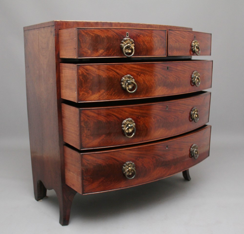 19th Century flame mahogany bowfront chest of drawers View III