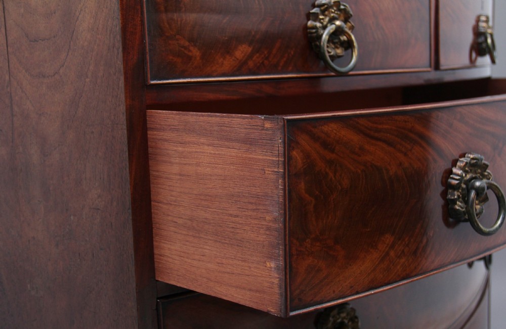19th Century flame mahogany bowfront chest of drawers View IX