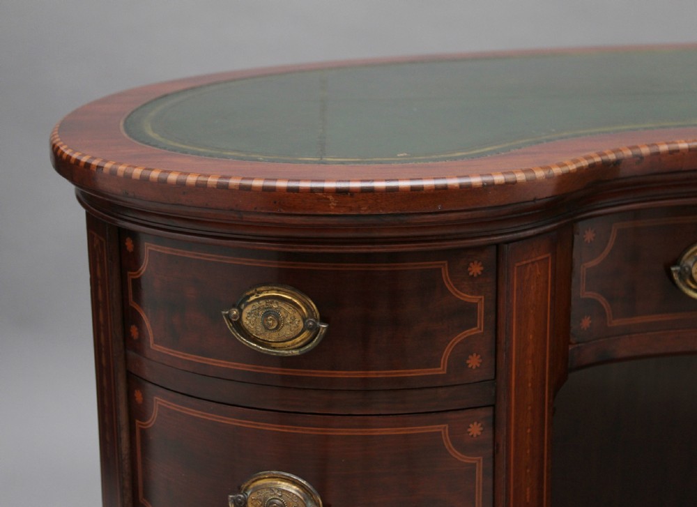 19th Century inlaid mahogany kidney shaped desk with a wonderful provenance  View X