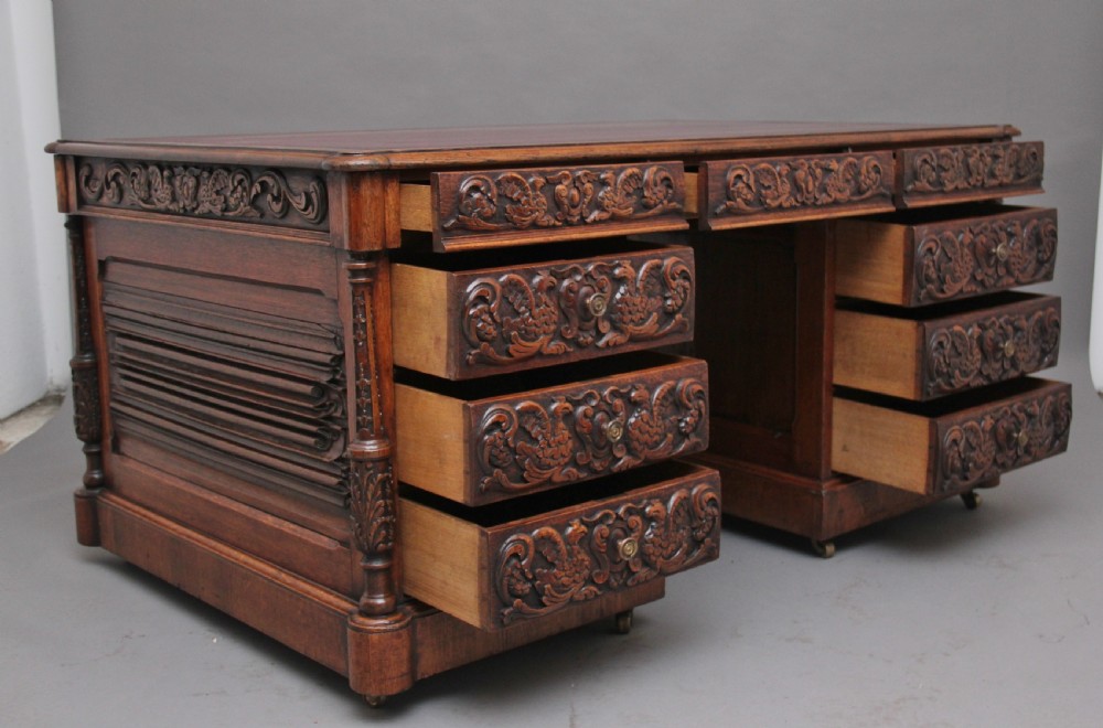 19th Century carved oak partners desk View XVII