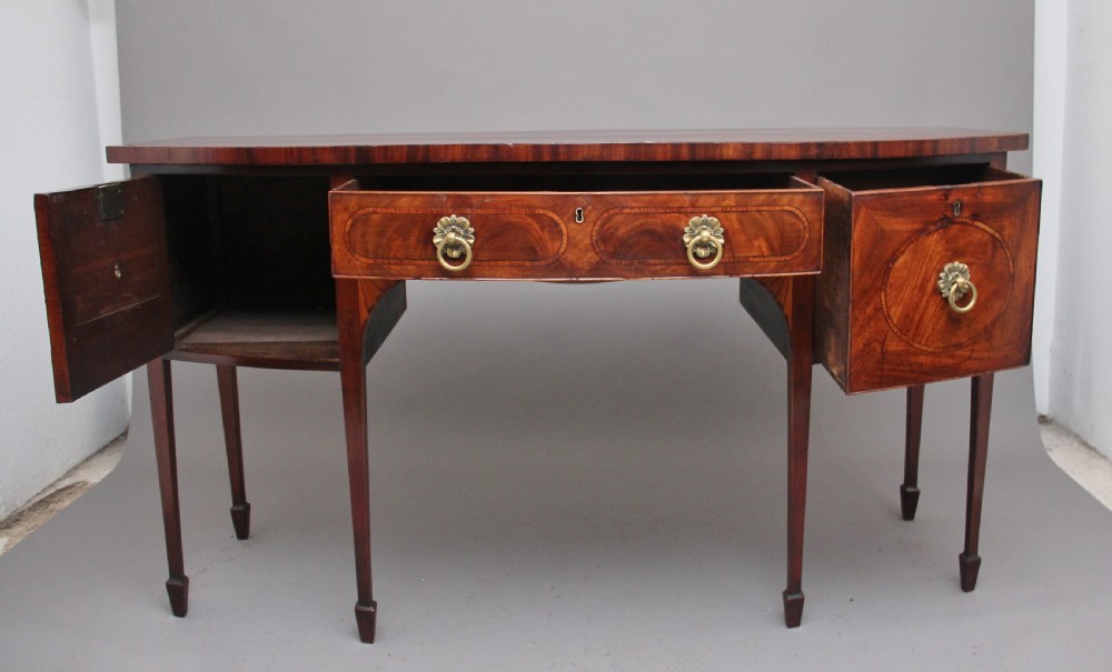 Early 19th Century inlaid mahogany bow front sideboard  View II
