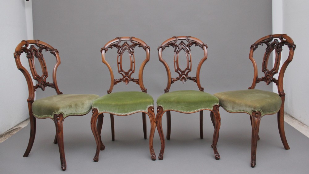Set of four 19th Century walnut dining chairs View II