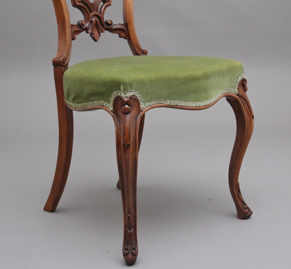 Set of four 19th Century walnut dining chairs View XI