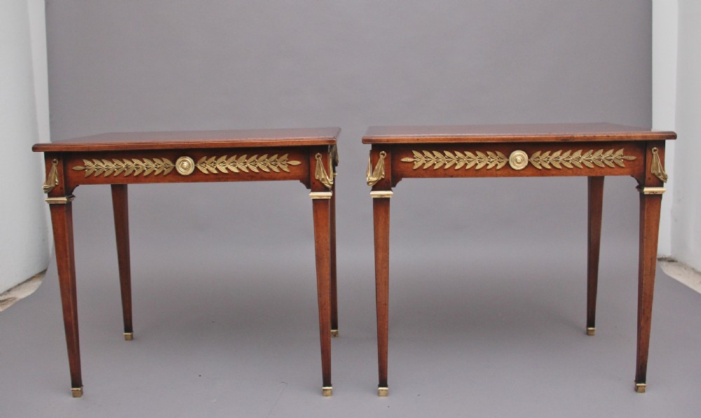 Pair of French mahogany and brass mounted lamp tables View II
