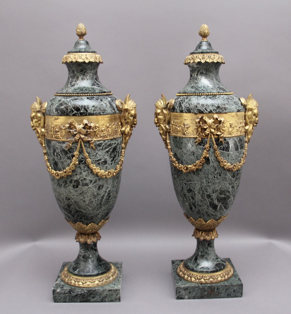 Pair 19th Century French marble and cassoulet urns View II