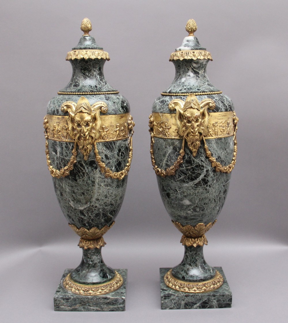 Pair 19th Century French marble and cassoulet urns View III