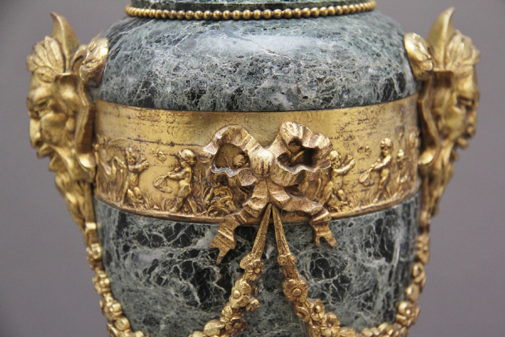 Pair 19th Century French marble and cassoulet urns View V