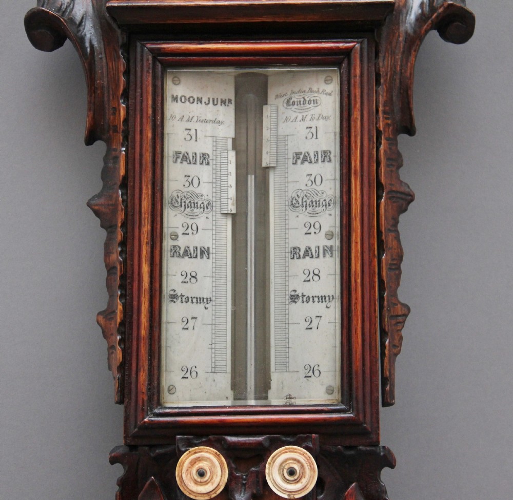 19th Century carved oak cased stick barometer View III