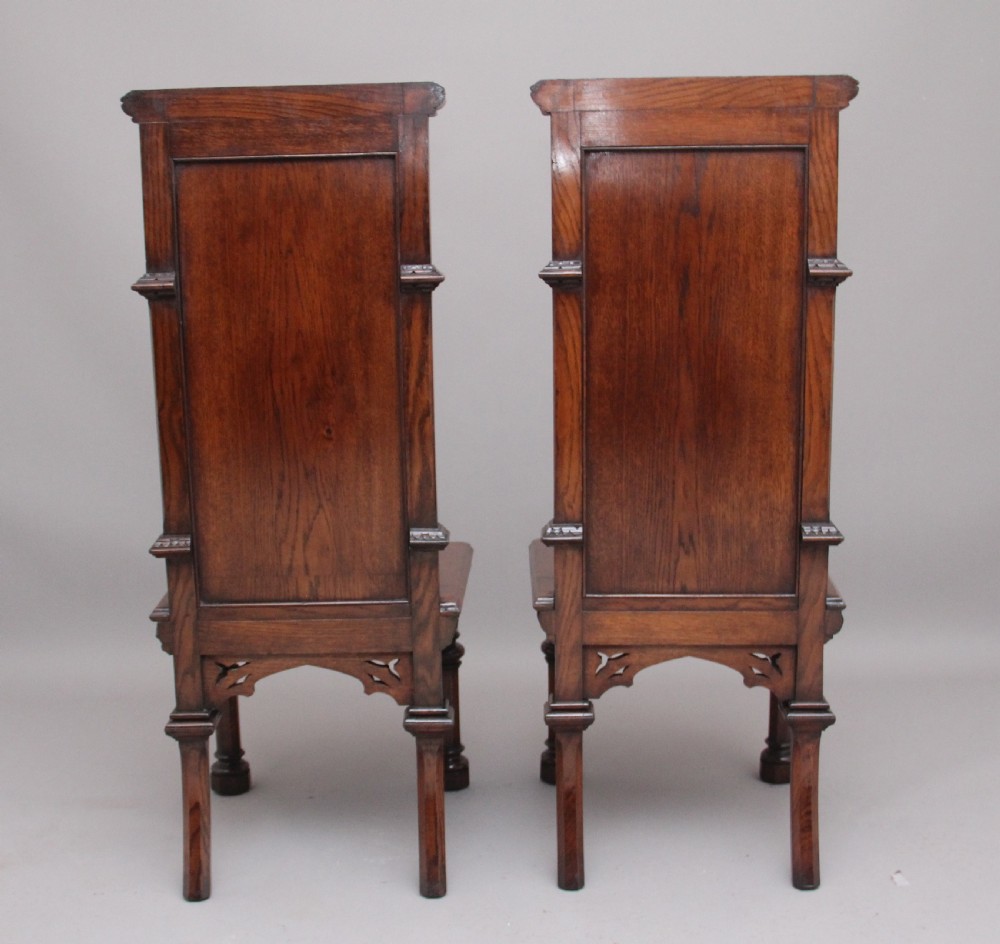 Near pair of 19th Century carved oak Gothic hall chairs View IV