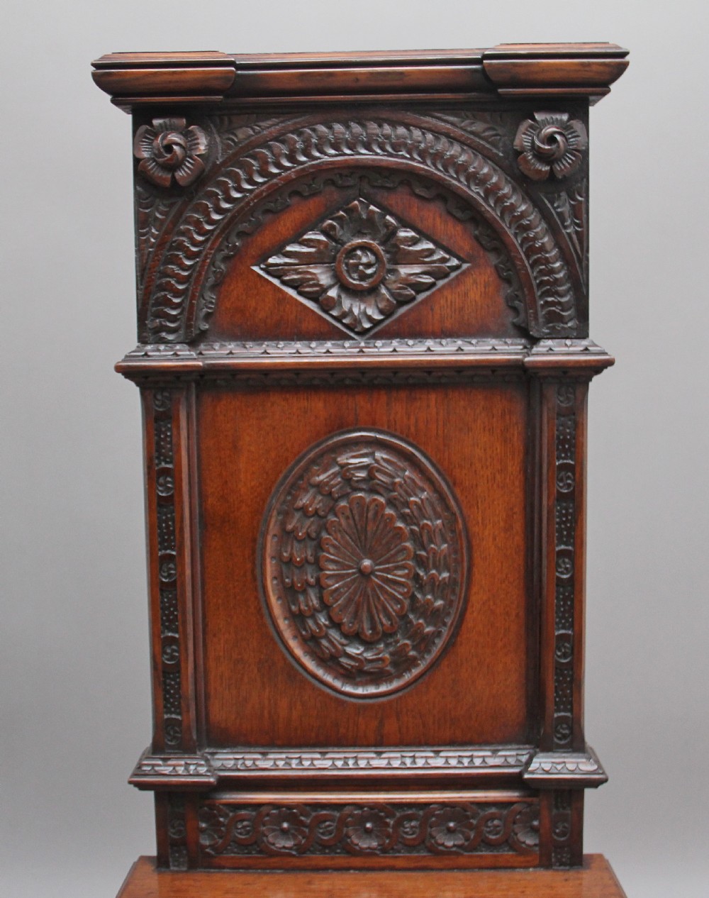 Near pair of 19th Century carved oak Gothic hall chairs View VI