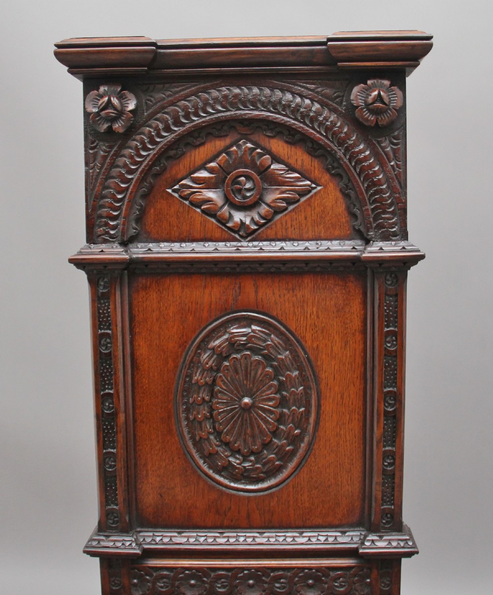 Near pair of 19th Century carved oak Gothic hall chairs View VII
