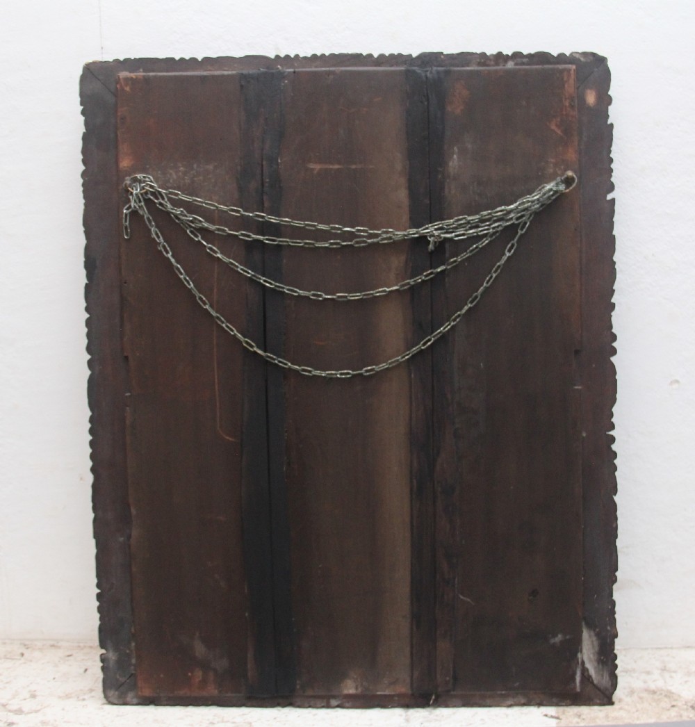 A rectangular 18th century wall mirror featuring a deeply carved dark oak frame with acanthus leaf motifs. View VII
