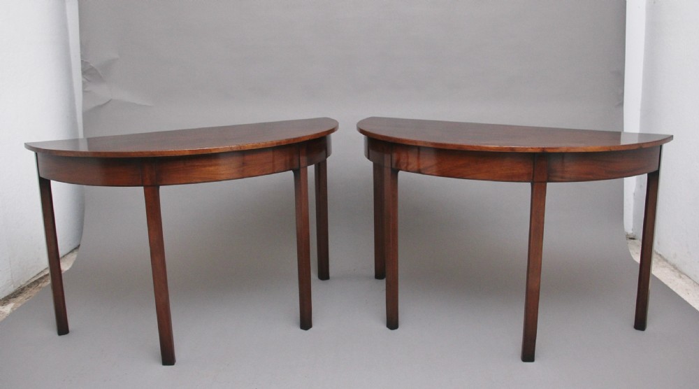Pair of early 19th Century mahogany demi lune console tables