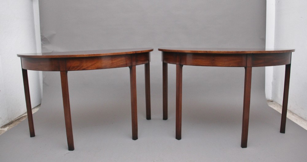 Pair of early 19th Century mahogany demi lune console tables View II