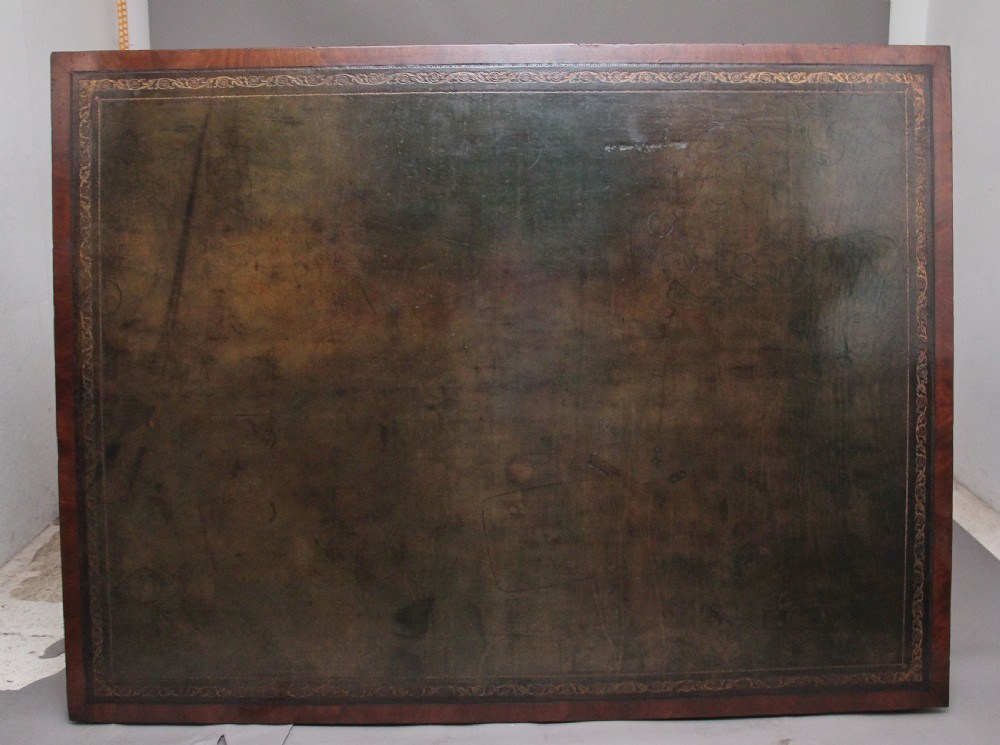 A large and impressive early 20th Century mahogany partners desk View IX