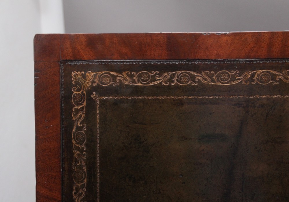 A large and impressive early 20th Century mahogany partners desk View X