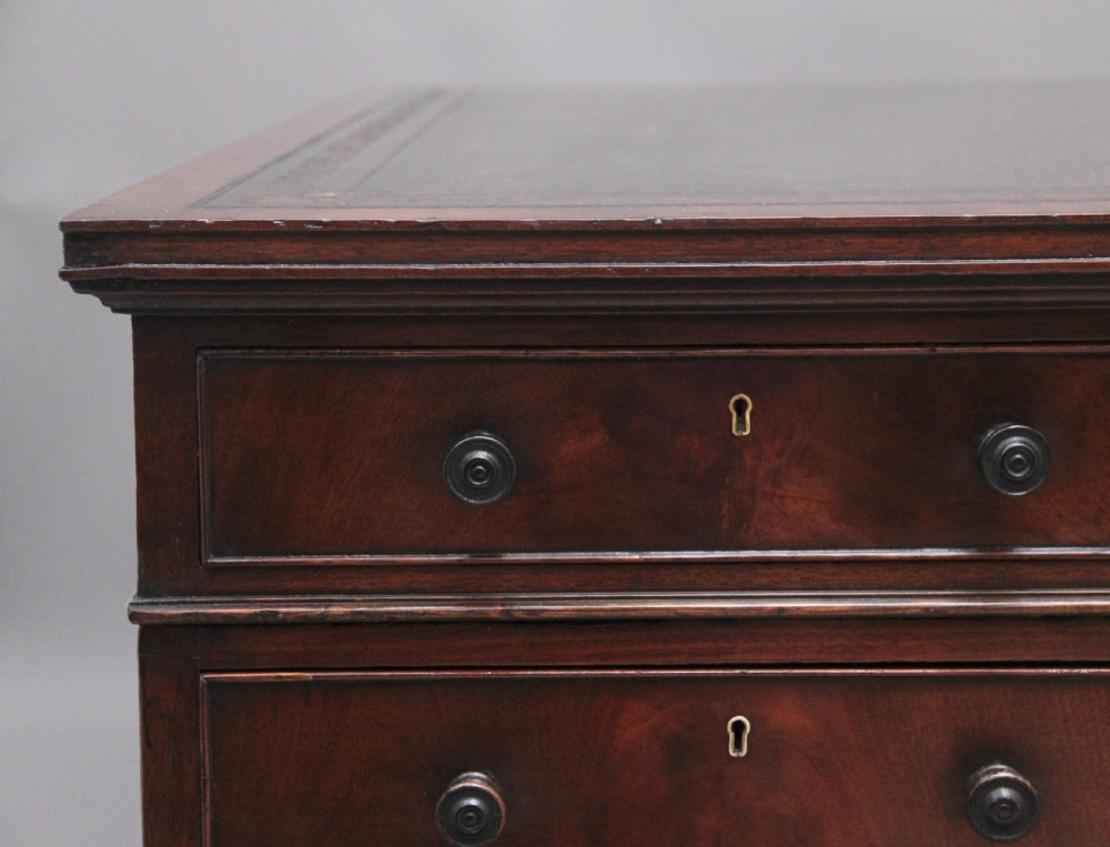 A large and impressive early 20th Century mahogany partners desk View XII