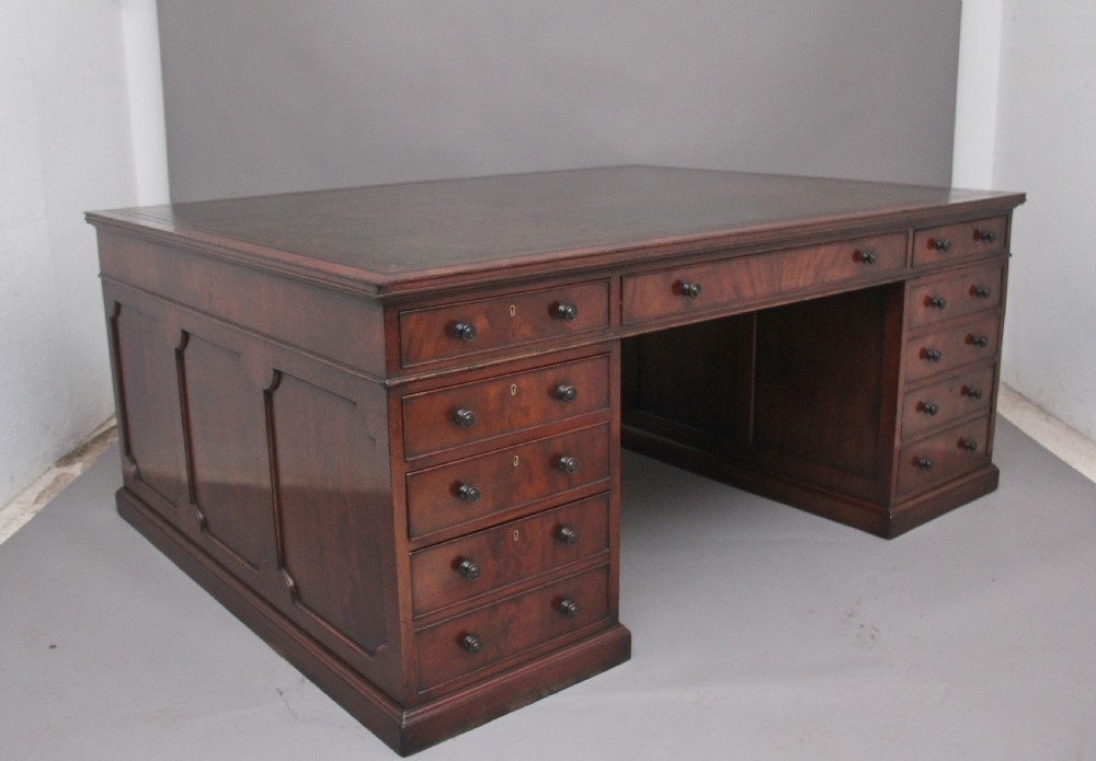 A large and impressive early 20th Century mahogany partners desk View XIV
