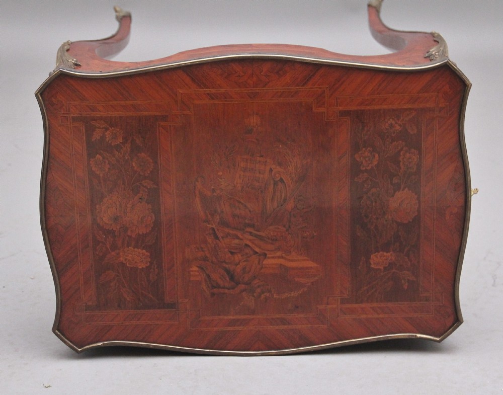 An early 20th-century French kingwood side table featuring slender cabriole legs, floral marquetry inlay, and gilt-metal mounts. View XV
