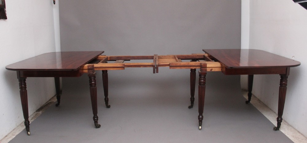 A large and impressive early 19th Century mahogany extending dining table View IV