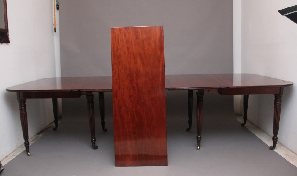 A large and impressive early 19th Century mahogany extending dining table View VI