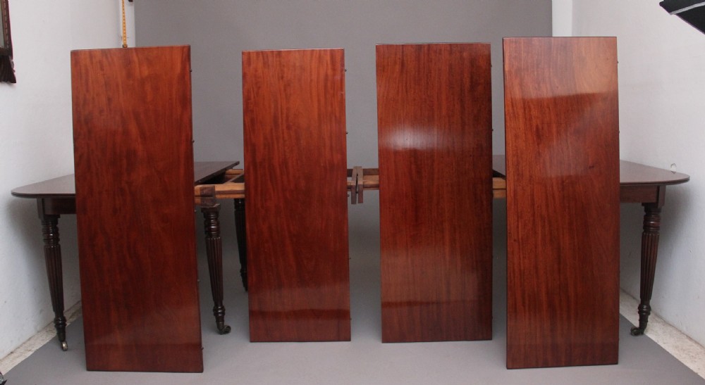 A large and impressive early 19th Century mahogany extending dining table View VII